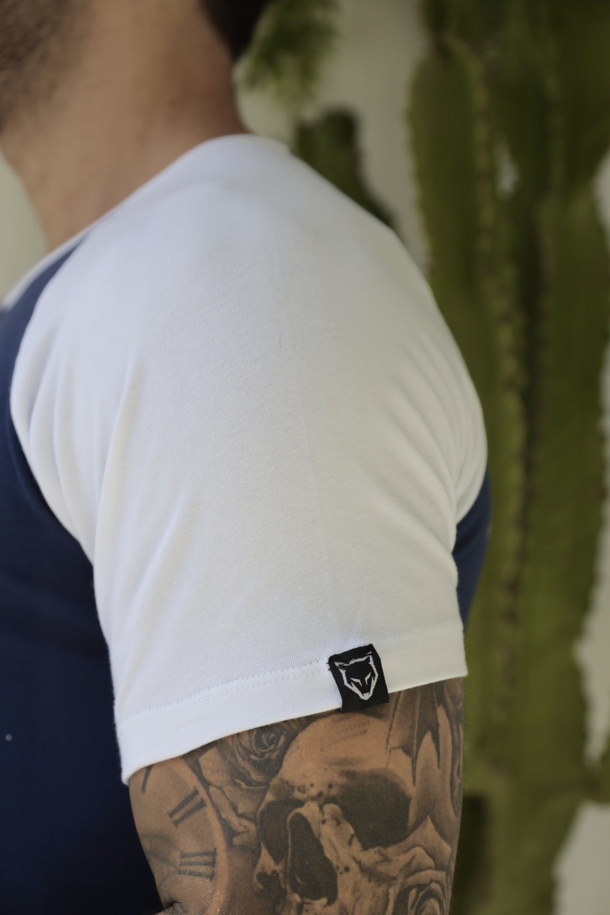 Camiseta Azul Long Line Raglan Volk Culture Cruz